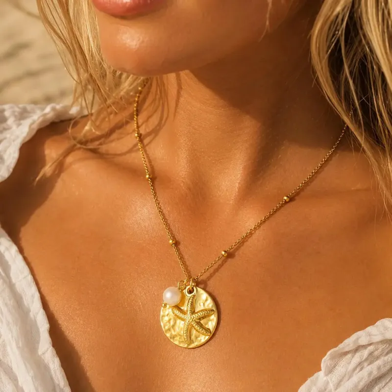 Hammered Coin & Starfish Necklace made by Victoria Emerson