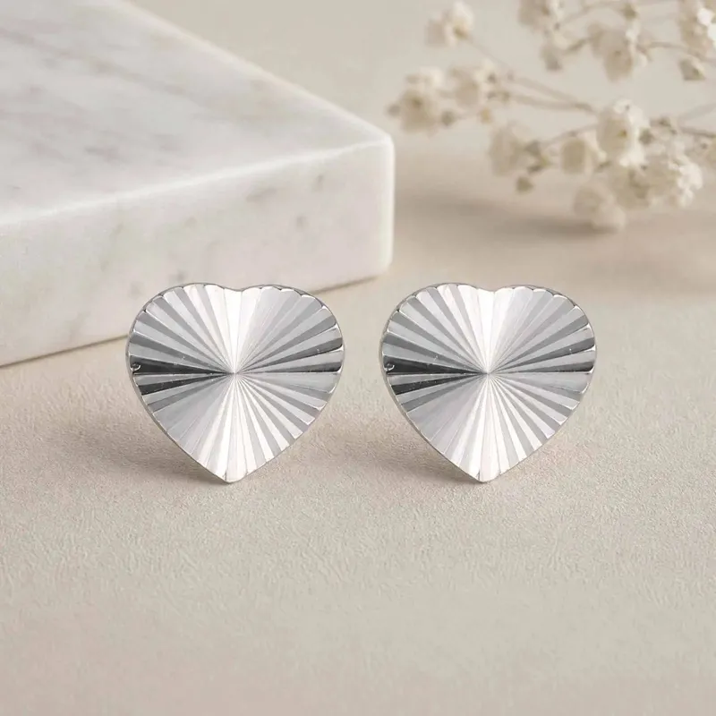 Silver Heart Sunburst Studs made by Victoria Emerson