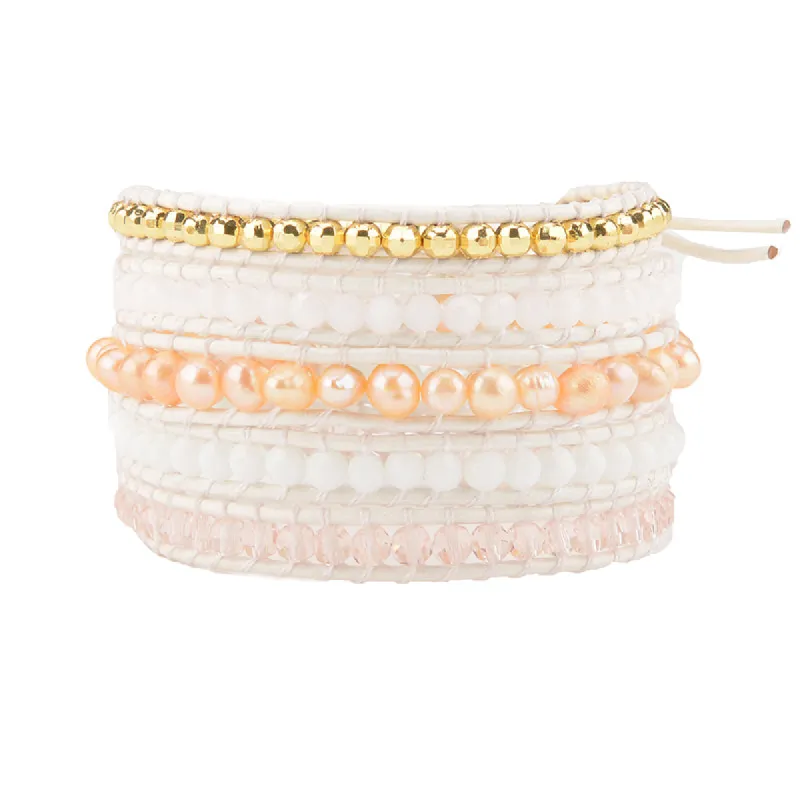 Peach Pearls and Crystals on White sold by Victoria Emerson