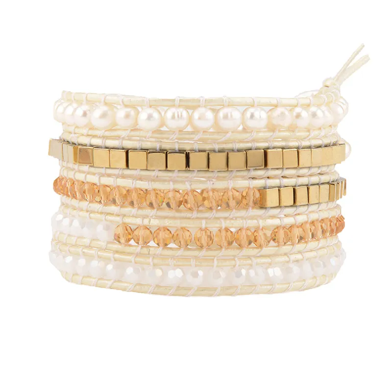 Cream Crystals with Gold Square Beads on Ivory sold by Victoria Emerson
