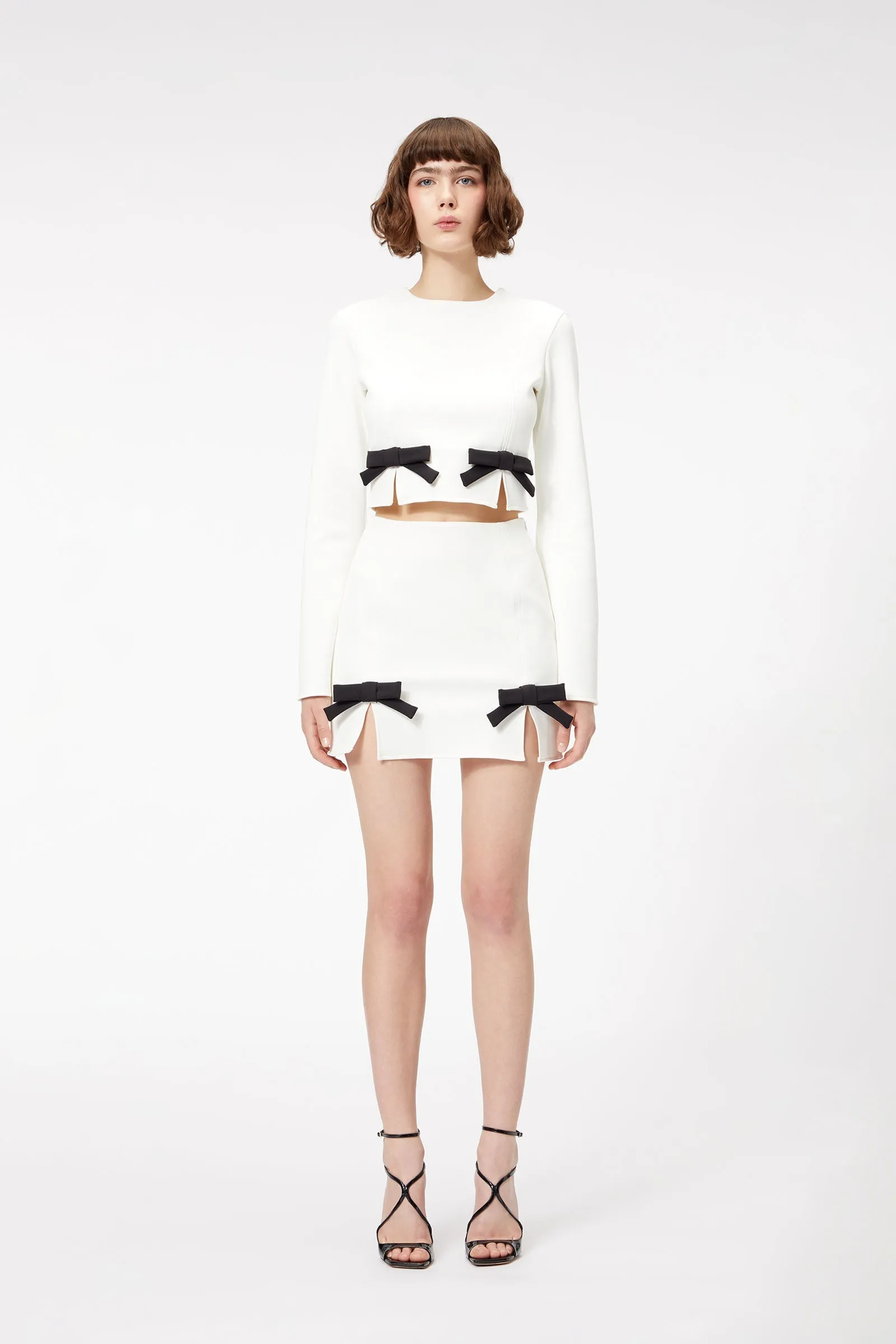 BOW & SLIT MINI SKIRT sold by Viktor & Rolf