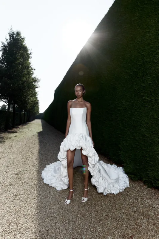 VRM457 – BUSTLED BORDER HIGH-LOW GOWN sold by Viktor & Rolf