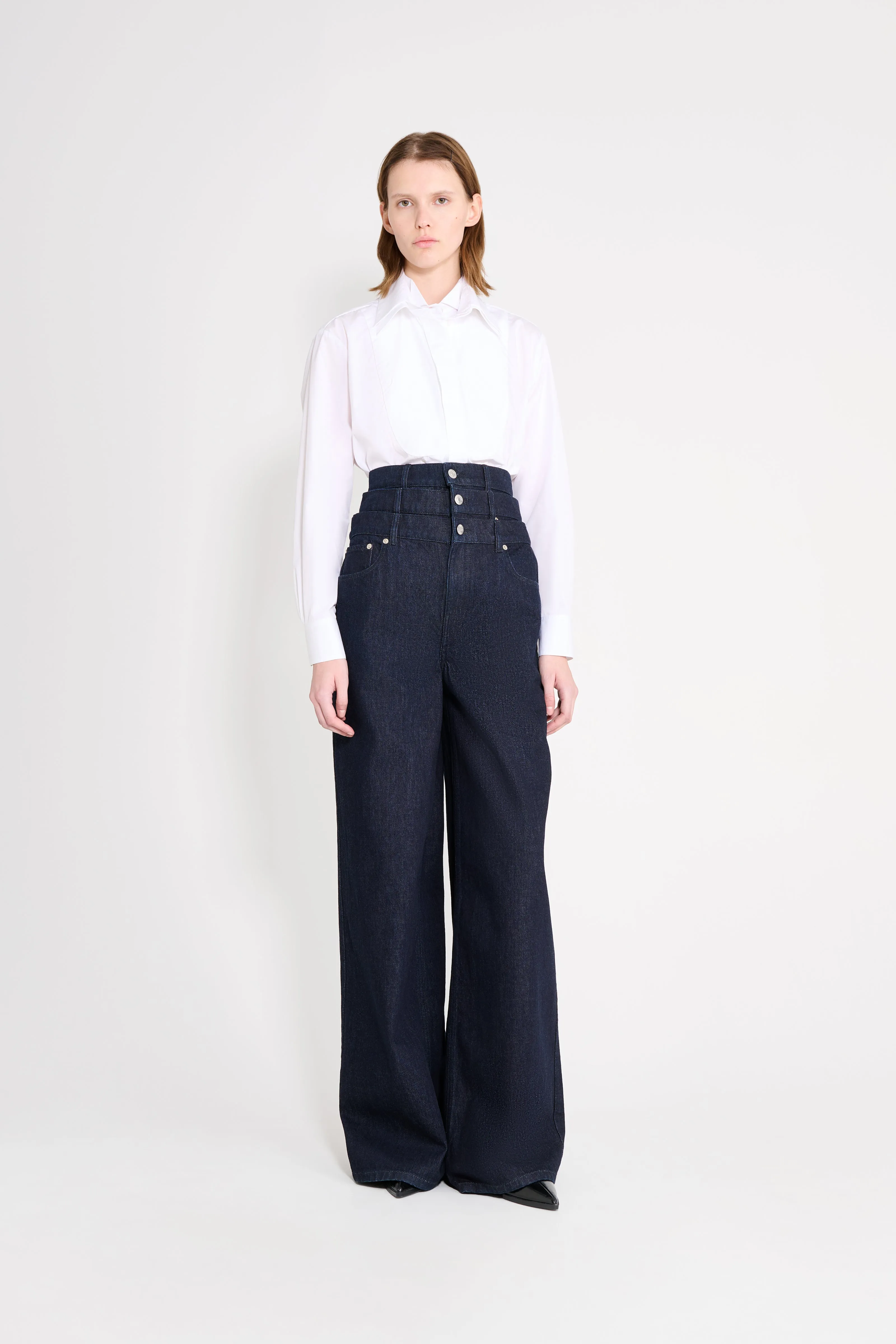 MULTI-LAYERED DENIM JEANS sold by Viktor & Rolf