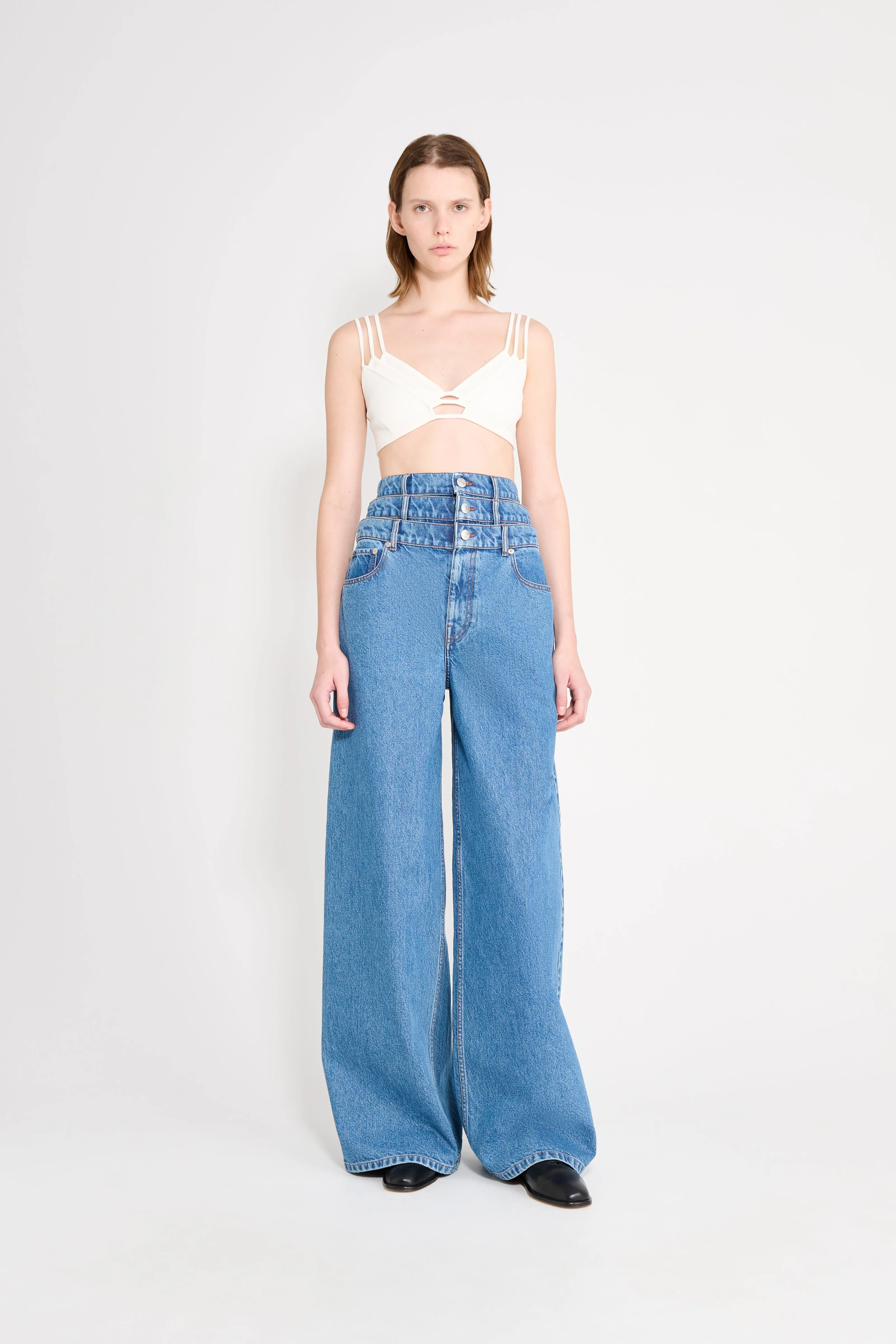MULTI-LAYERED DENIM JEANS sold by Viktor & Rolf