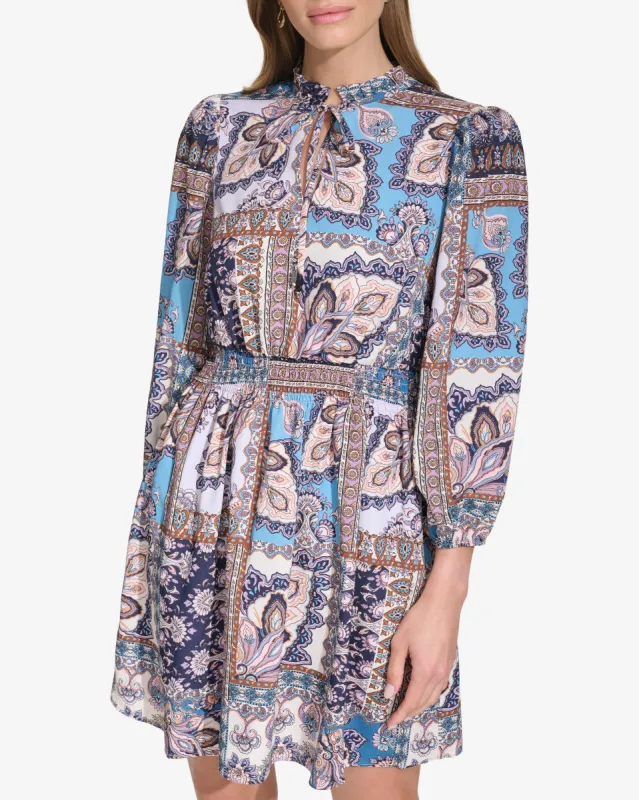 Geo Floral-Print Smocked Dress sold by Vince Camuto