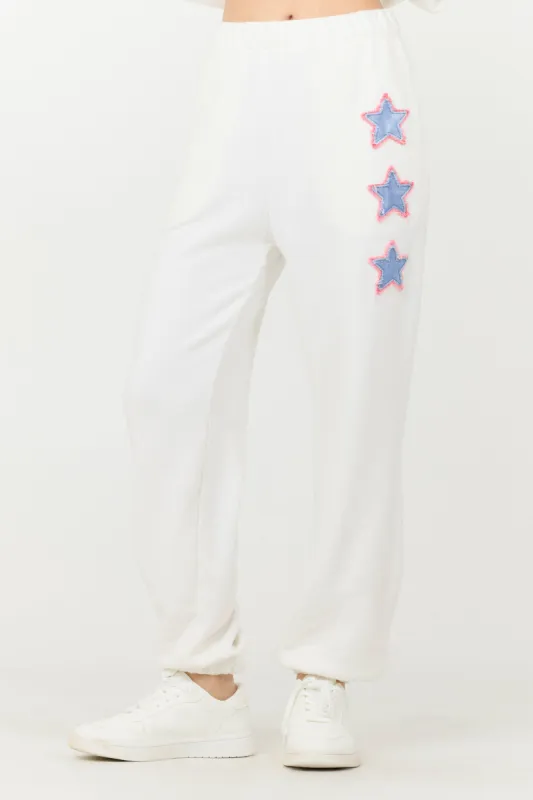 White w/ Blue Applique French Terry Joggers sold by Vintage Havana