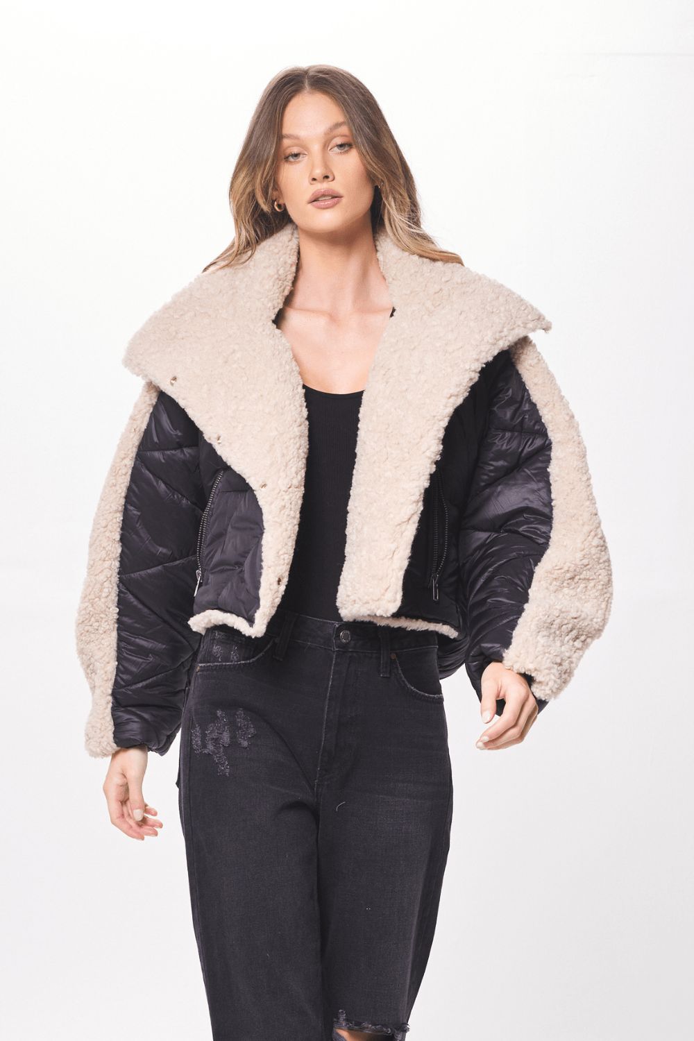 Black & Cream Mixed Media Puffer Shearling Jacket sold by Vintage Havana