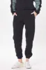 Black & Hunter Green Polar Fleece Jogger sold by Vintage Havana