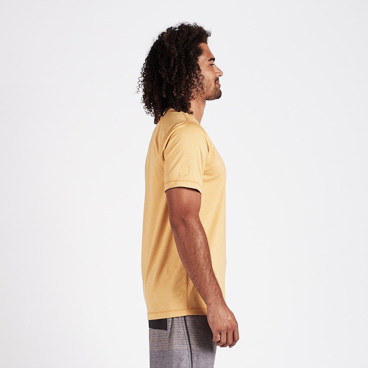 Tradewind Performance Tee | Saffron Heather sold by Vuori product image thumbnail 2