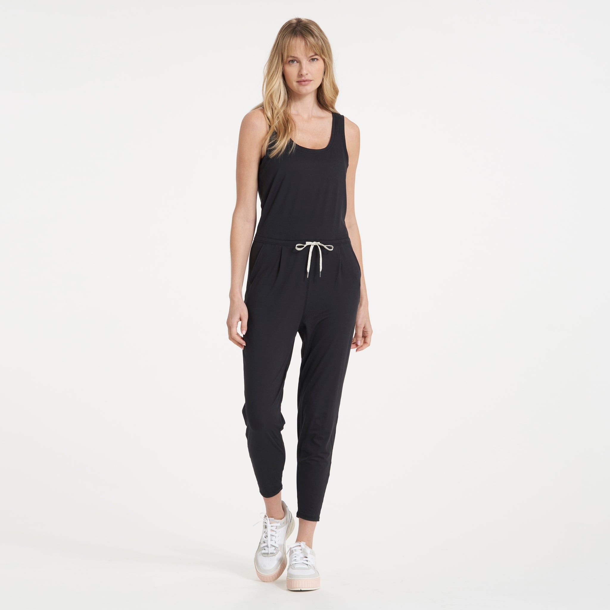 Lux At Ease Jumpsuit | Black sold by Vuori