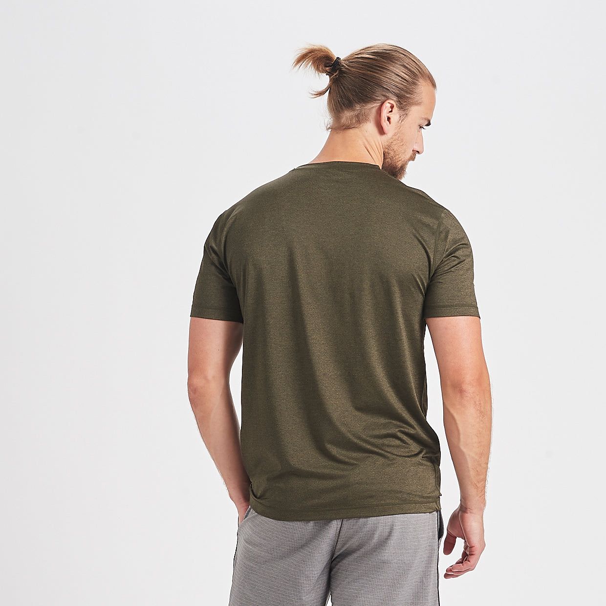 Tradewind Performance Tee | Evergreen Heather sold by Vuori