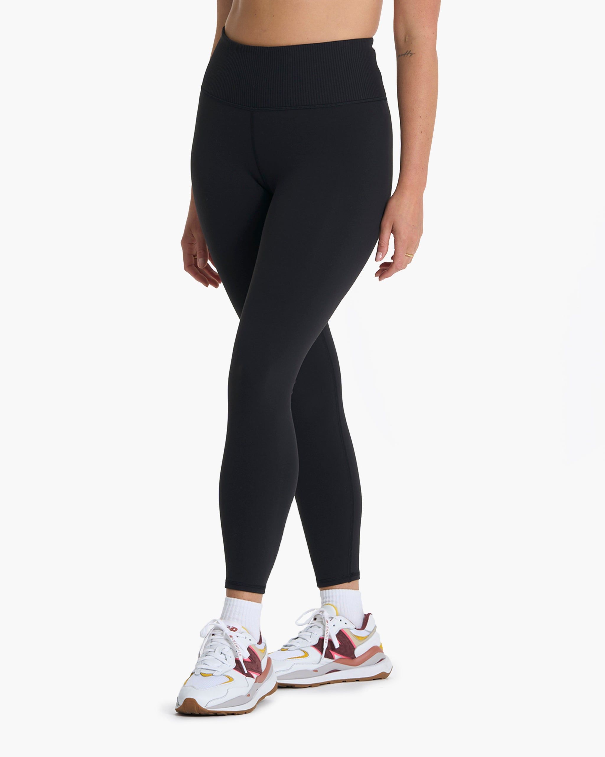 Rib Studio Legging | Black sold by Vuori