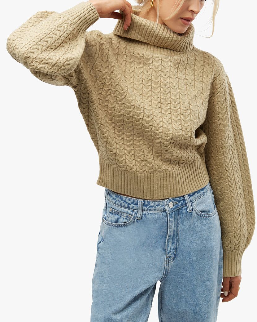 Turtleneck Cable Sweater sold by WeWoreWhat