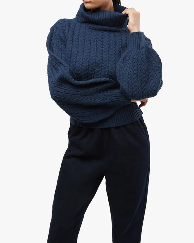 Turtleneck Cable Sweater sold by WeWoreWhat