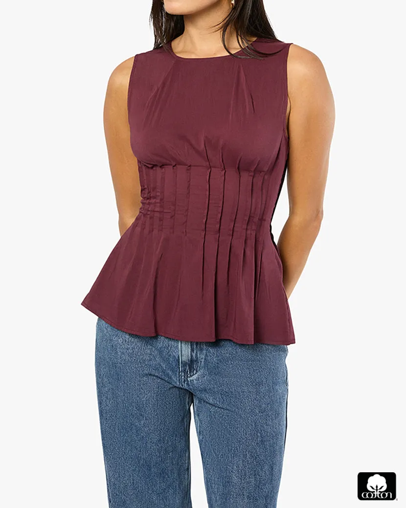 Pleated Peplum Top sold by WeWoreWhat