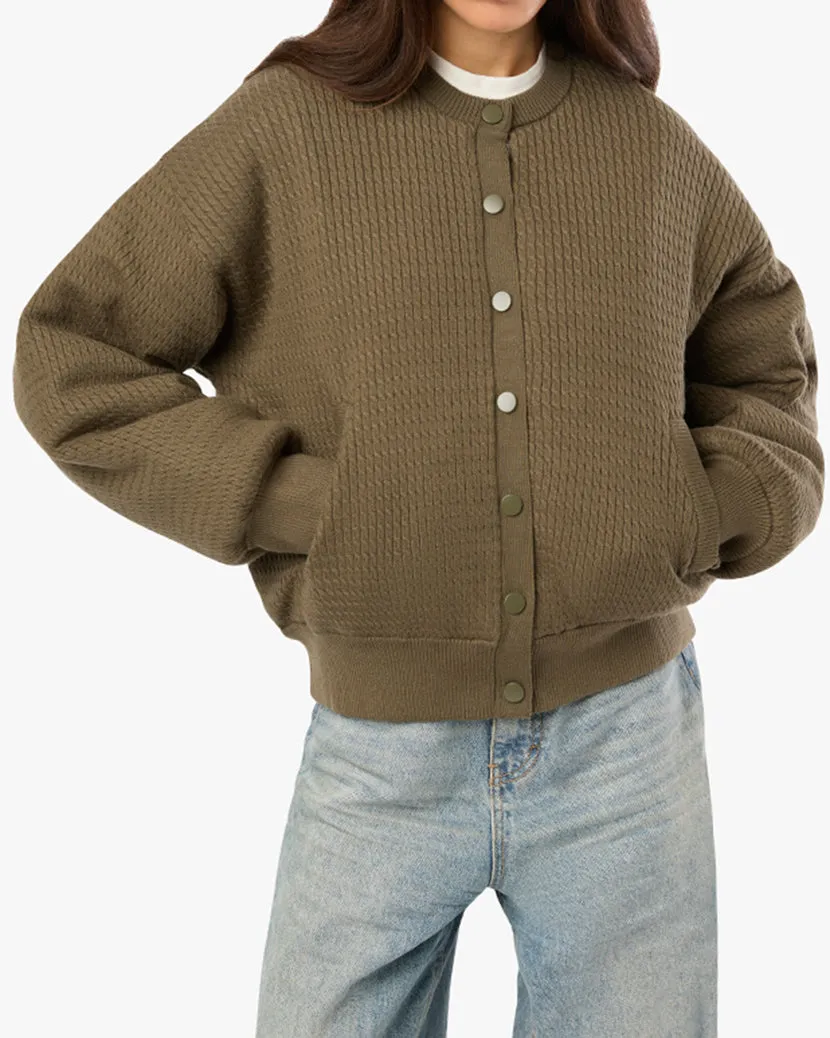 Cable Knit Puffer Jacket sold by WeWoreWhat