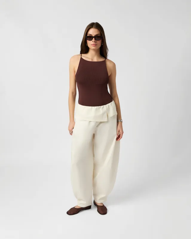 High Neck Bodysuit sold by WeWoreWhat