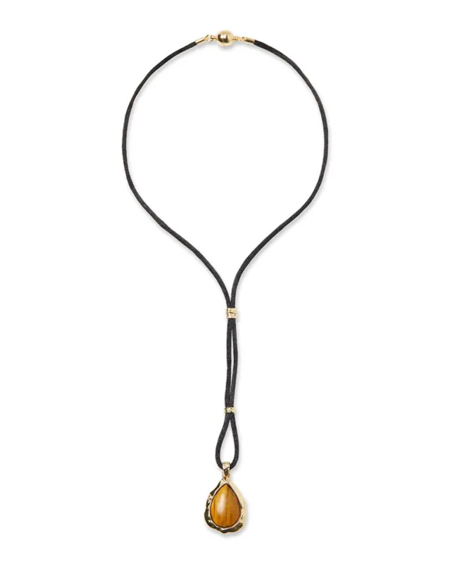 Hammered Tigers Eye Pendant On Black Cord sold by WeWoreWhat