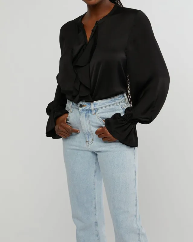 Ruffle Blouse sold by WeWoreWhat