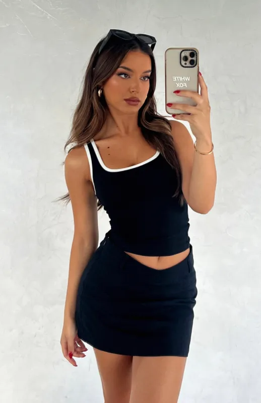 She's Motivated Mini Skirt Black sold by White Fox Boutique