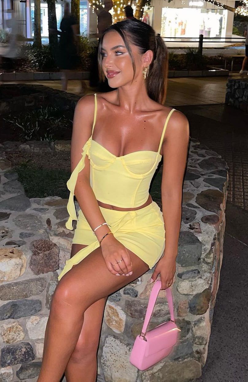 The Last Goodbye Mini Skirt Lemon sold by White Fox Boutique