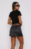 Let's Get Over It Mini Skirt Midnight Bloom sold by White Fox Boutique