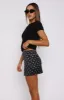 Let's Get Over It Mini Skirt Midnight Bloom sold by White Fox Boutique