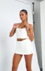 Walk And Talk Mini Skort White sold by White Fox Boutique