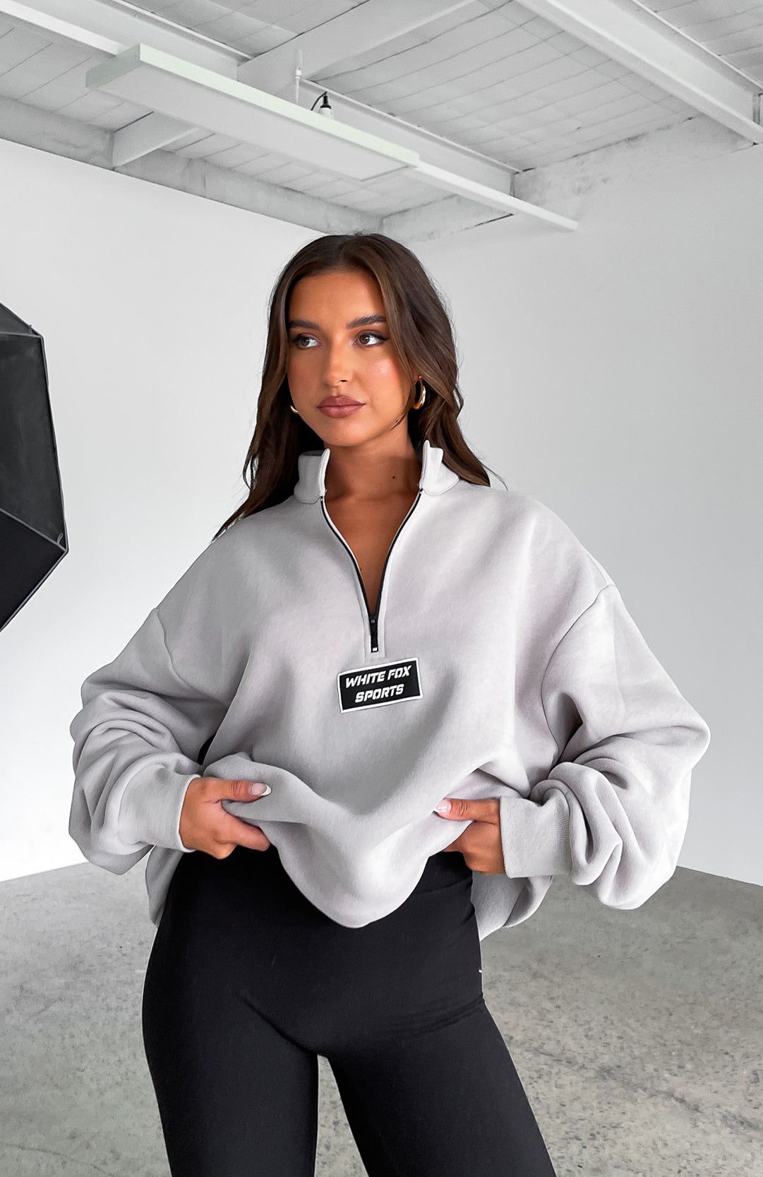 The Elite Zip Front Sweater Lunar sold by White Fox Boutique