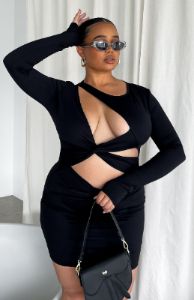 Feel The Movement Long Sleeve Mini Dress Black sold by White Fox Boutique