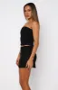 Unreal Love Mini Skirt Black sold by White Fox Boutique