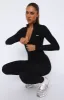 Exceed Long Sleeve Jumpsuit Black sold by White Fox Boutique