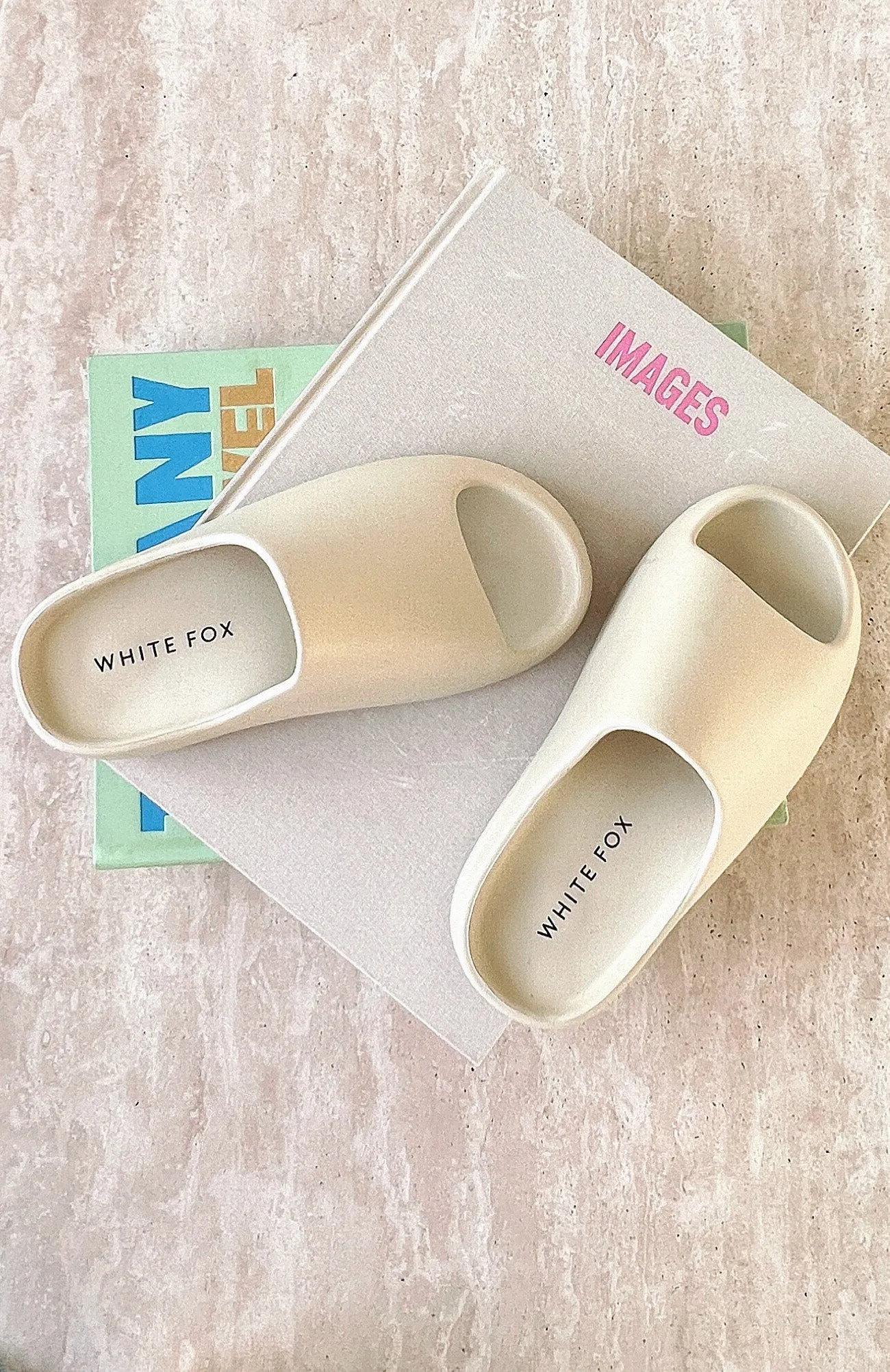 On The Edge Slides Off White sold by White Fox Boutique