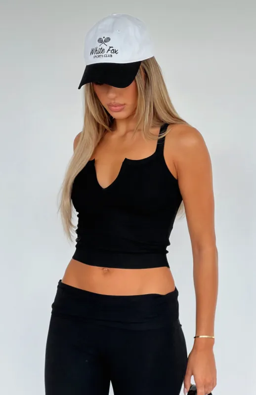 Time Slows Down Top Black sold by White Fox Boutique