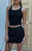 Keep Me Waiting Mini Skirt Black sold by White Fox Boutique