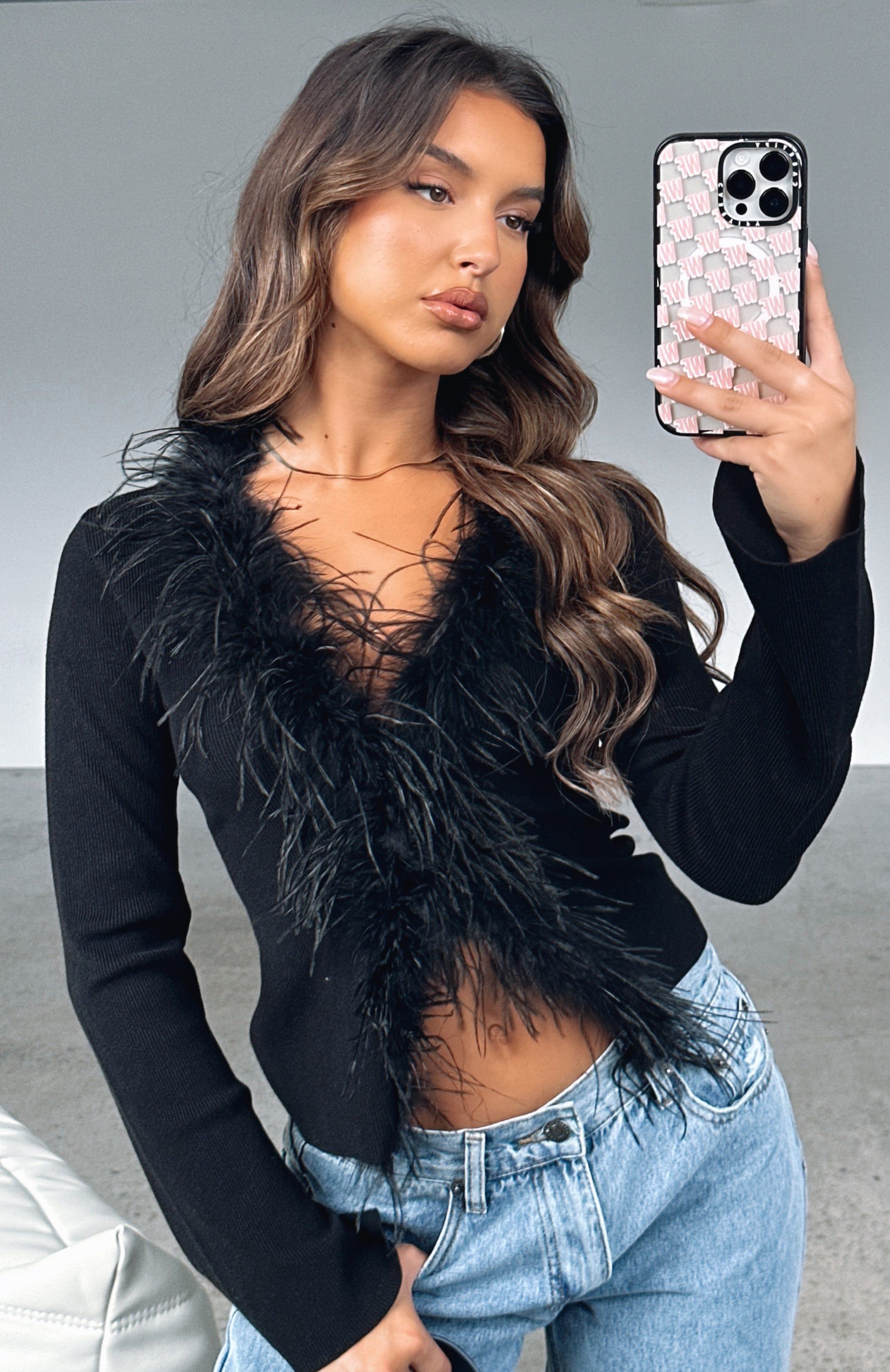 The Night Is Young Long Sleeve Top Black sold by White Fox Boutique