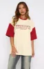 Fearlessly Flying Oversized Tee Cream sold by White Fox Boutique