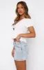 Let's Get Away Denim Mini Skirt Light Blue Wash sold by White Fox Boutique