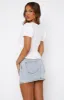 Let's Get Away Denim Mini Skirt Light Blue Wash sold by White Fox Boutique