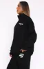 Offstage Zip Front Sweater Monochrome sold by White Fox Boutique