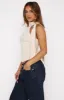 Spilling Secrets Top Bone sold by White Fox Boutique