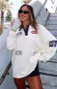 Only Time Will Tell Oversized Long Sleeve Tee Cream sold by White Fox Boutique