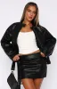 Tell Me Nothing Mini Skirt Black sold by White Fox Boutique