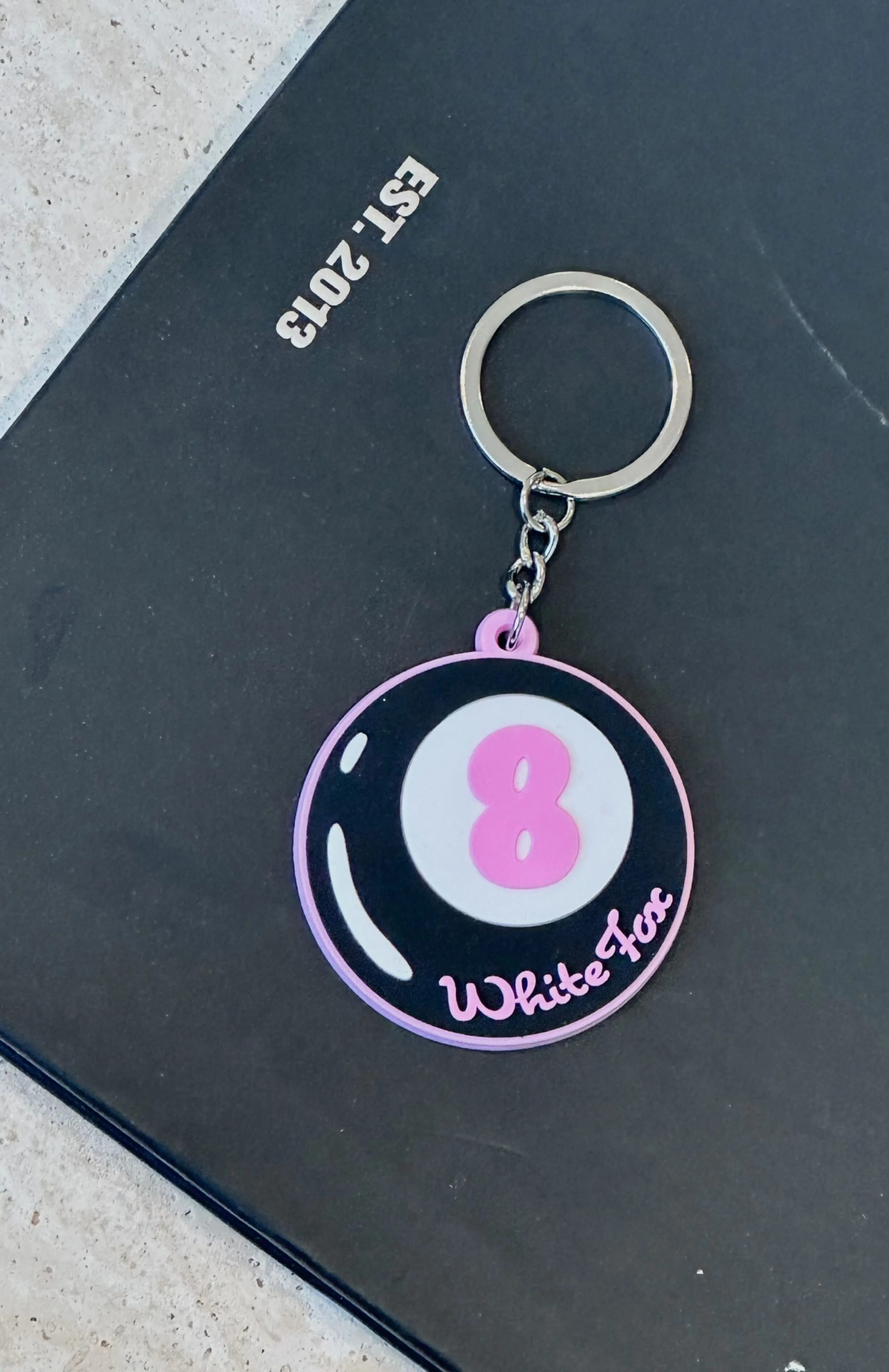 In Motion Keychain Black sold by White Fox Boutique