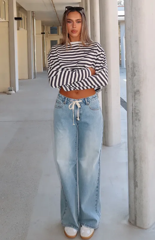 Kendall Mid Rise Wide Leg Jeans Light Blue sold by White Fox Boutique
