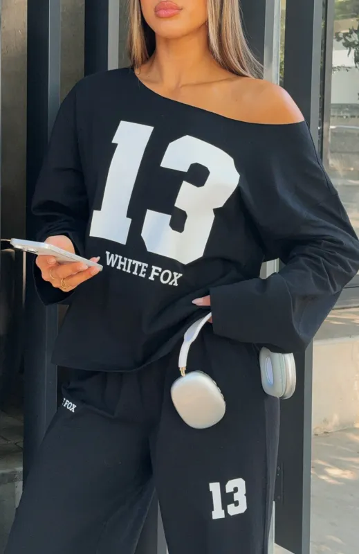 Only One Left Off Shoulder Oversized Long Sleeve Tee Black made by White Fox Boutique