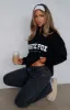 High Standard Zip Front Sweater Black sold by White Fox Boutique
