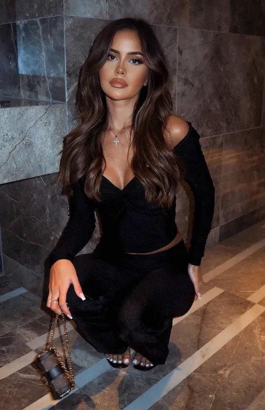 Bleeding Love Long Sleeve Top Black made by White Fox Boutique