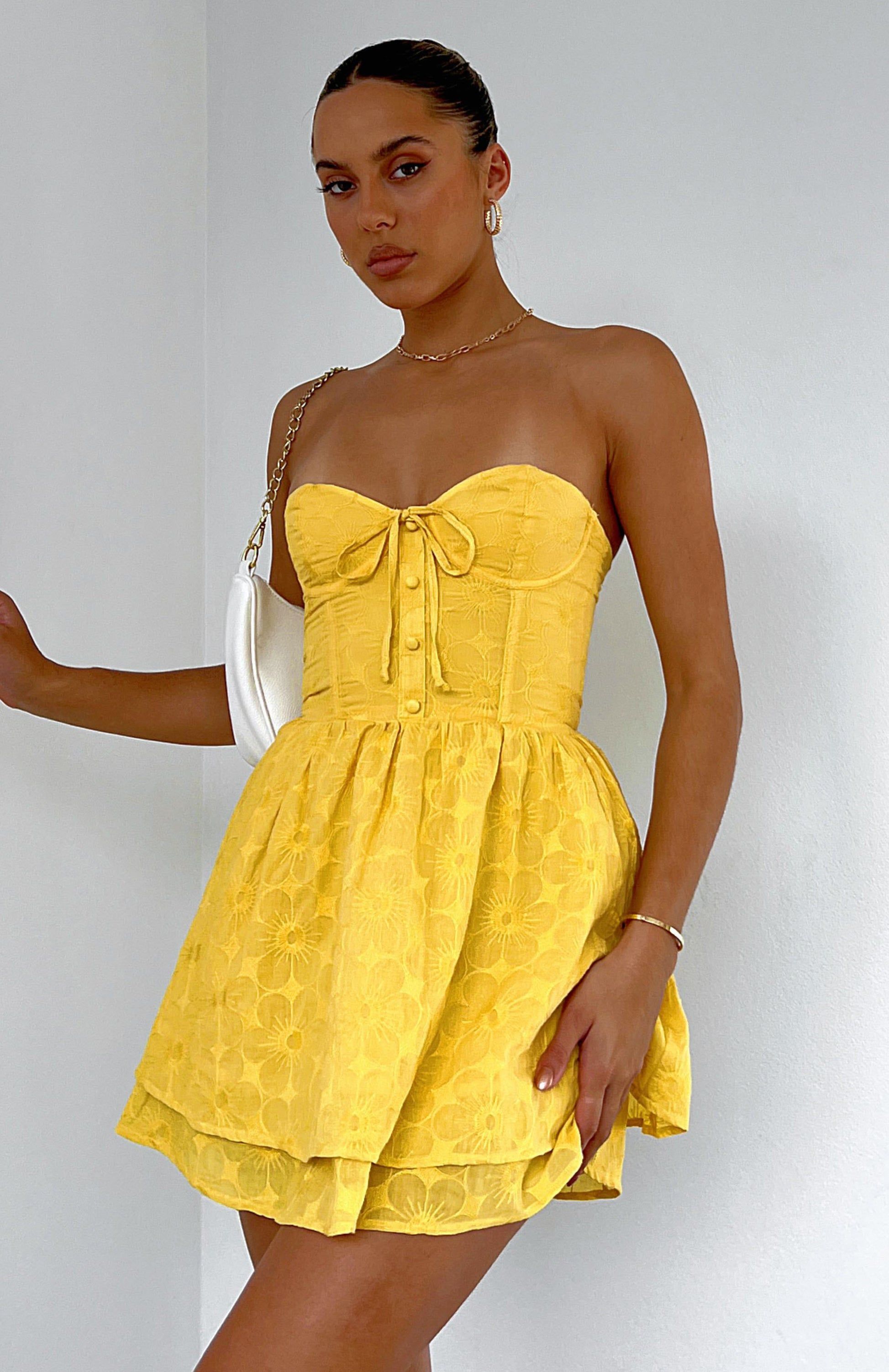 Flowers In The Rain Mini Dress Buttercup sold by White Fox Boutique