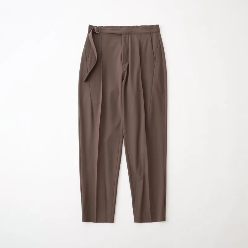 1 TUCK TAPERED PANTS sold by White Mountaineering